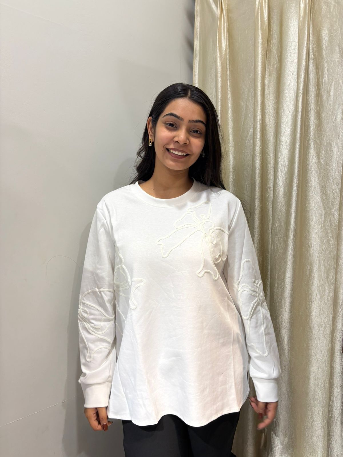 Solid embroidered sweat top